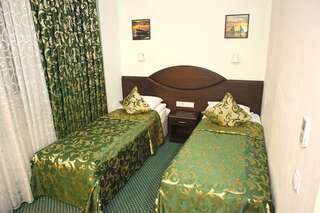 Гостиница Ринг Волгоград  Стандартный двухместный номер с 2 отдельными кроватями-1